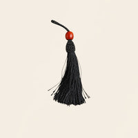 Noir Tassel